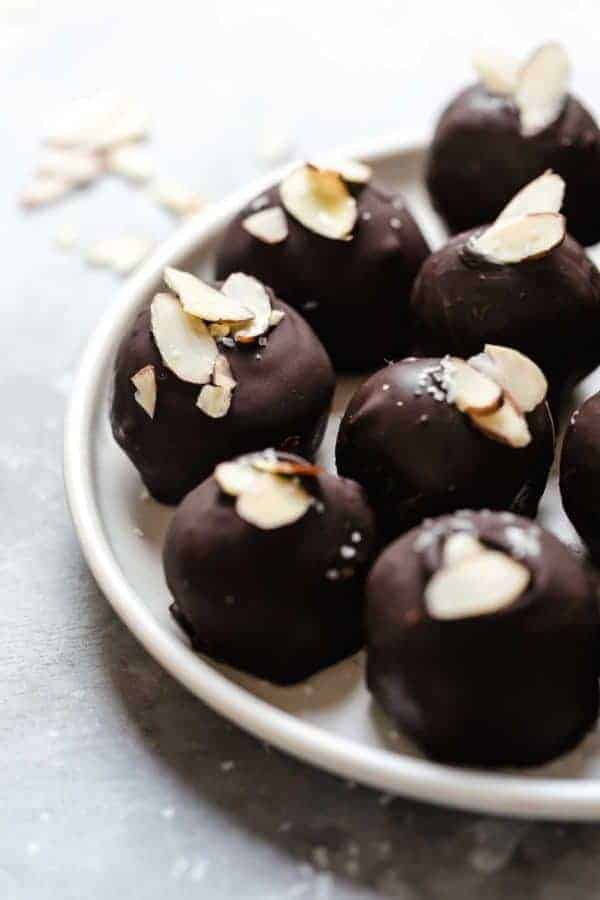 Close up view of Pumpkin Pie Truffles on a white plate