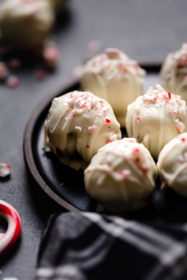 Close view of Peppermint Brownie Batter Truffles on a brown platter