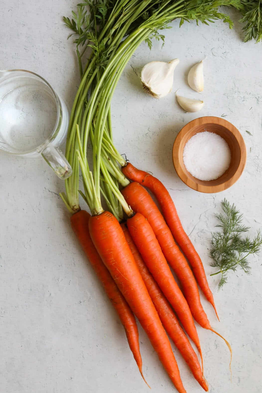 Ingredients to make homemade fermented carrots. 
