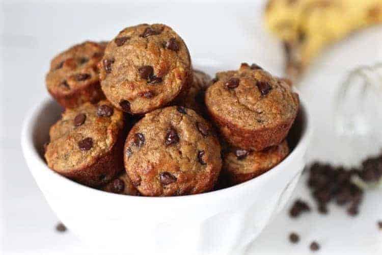 Get ready to fill your home with a mouthwatering aroma and better yet, sink your teeth into the most delicious grain-free Banana Chocolate Chip Mini Muffins | Grain-free | Gluten-free | Paleo | Dairy-free | http://simplynourishedrecipes.com/banana-chocolate-chip-mini-muffins/