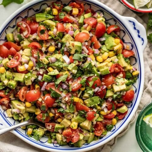 Overhead view of a large bowl of Avocado Salsa topped with fresh cilantro.