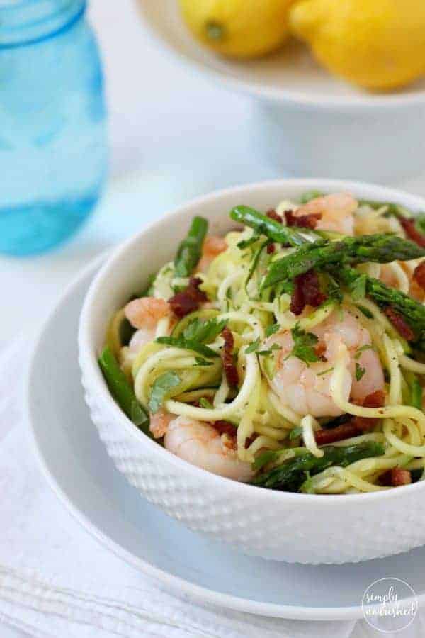 Zucchini Pasta Carbonara with Shrimp in a white bowl 