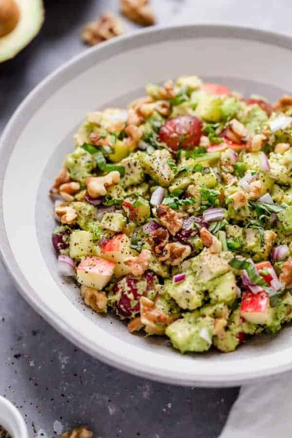 Photo of Avocado Chicken Waldorf Salad on a white plate.