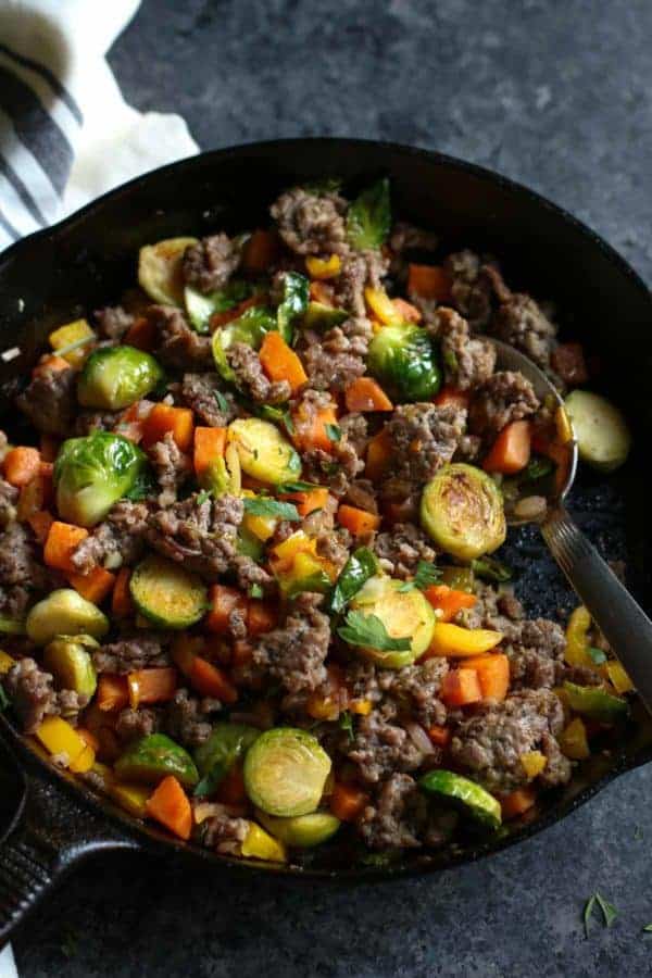 Brussels Sprouts Sweet Potato Hash in a cast iron skillet
