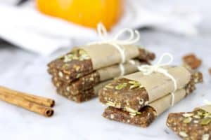 Pumpkin Spice Protein Bars stacked on a counter