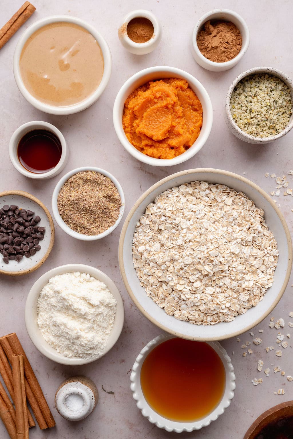 Ingredients to make no-bake pumpkin protein bars with chocolate chips.
