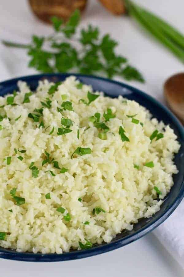 How To Make Cauliflower Rice: A step-by-step photo tutorial  how to cook cauliflower rice | cauliflower rice recipes | whole30 side dishes | gluten-free side dishes | dairy-free side dishes | vegan side dishes | paleo side dishes | gluten-free cauliflower rice | whole30 recipe ideas || The Real Food Dietitians #whole30recipes #cauliflowerrice