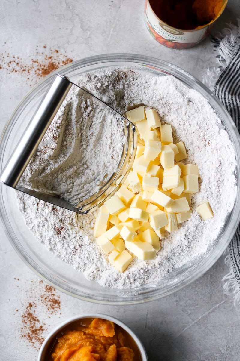 Cold butter bring cut into flour using a pastry cutter