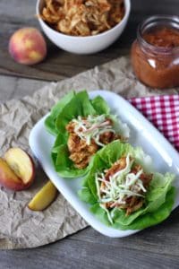 Get the flavor of a summertime barbecue from your slow cooker with this easy Slow Cooker Peach BBQ Chicken | Whole30 chicken recipes | Paleo chicken recipes | Grain-free chicken recipes | Gluten-free chicken recipes | Dairy-free chicken recipes | Whole30 slow cooker recipes | whole30 dinner recipes || The Real Food Dietitians #whole30dinner #healthyslowcooker #easydinners