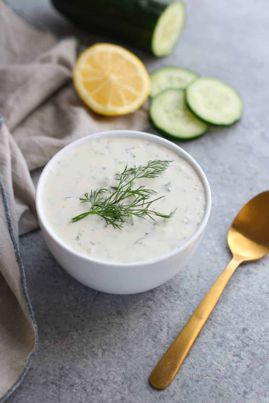 Paleo Tzatziki Sauce is dairy-free, Whole30-friendly and vegan-optional. | whole30 sauce recipes | dairy free dips | vegan dip recipe | paleo dip recipes | homemade tzatziki sauce | healthy tzatziki sauce || The Real Food Dietitians #whole30recipe #whole30approved #tzatzikisauce