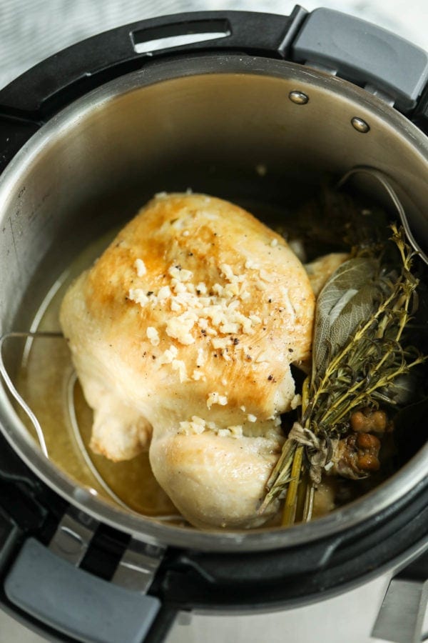 Instant Pot Whole Chicken done and ready to be removed from the pot. 