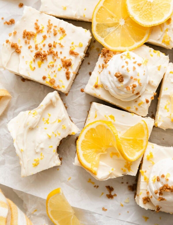 Overhead view of No Bake Lemon Cheesecake Bars topped with lemon zest