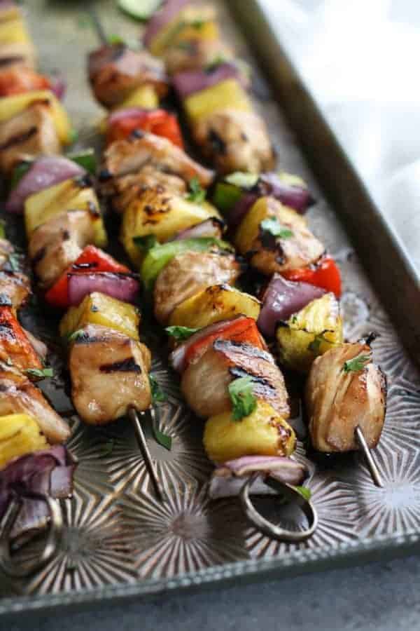Teriyaki Chicken and Pineapple Kebabs on a cooking sheet