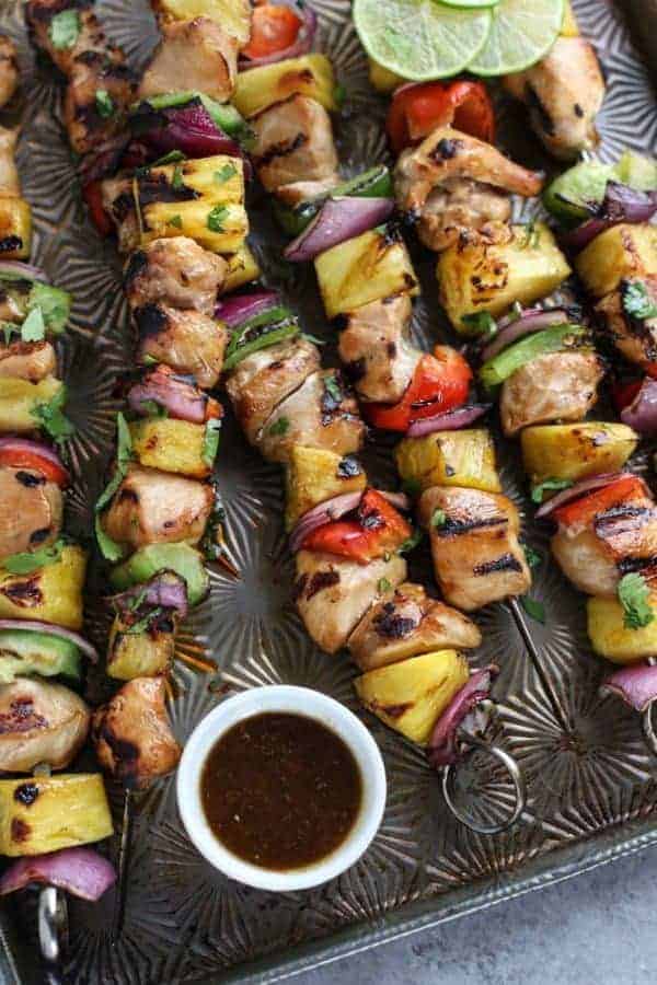 Teriyaki Chicken and Pineapple Kebabs on a cooking sheet