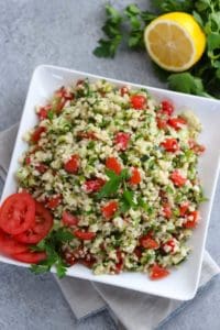  Cauliflower Tabbouleh Salad on a white plate