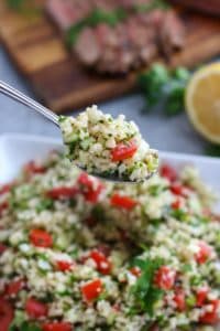  Cauliflower Tabbouleh Salad on a silver spoon