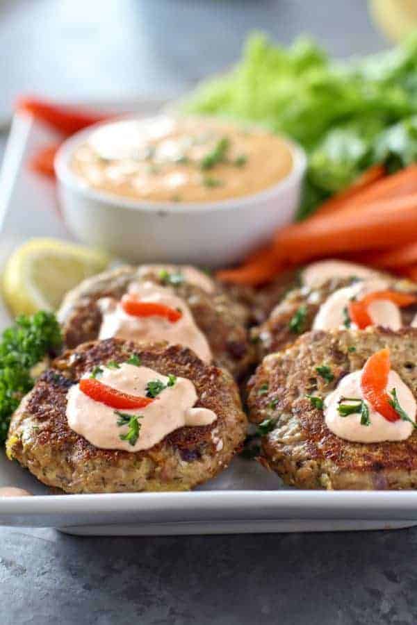 Easy Tuna Cakes with Roasted Red Pepper Mayo on a white plate