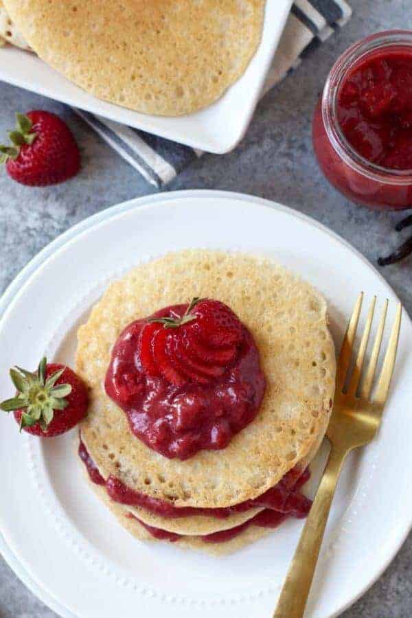 Paleo Vegan Pancakes on a white plate with the camera looking over the top