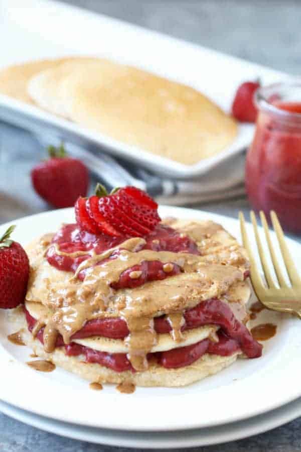 Paleo Vegan Pancakes with vanilla bean sauce and strawberry jam 