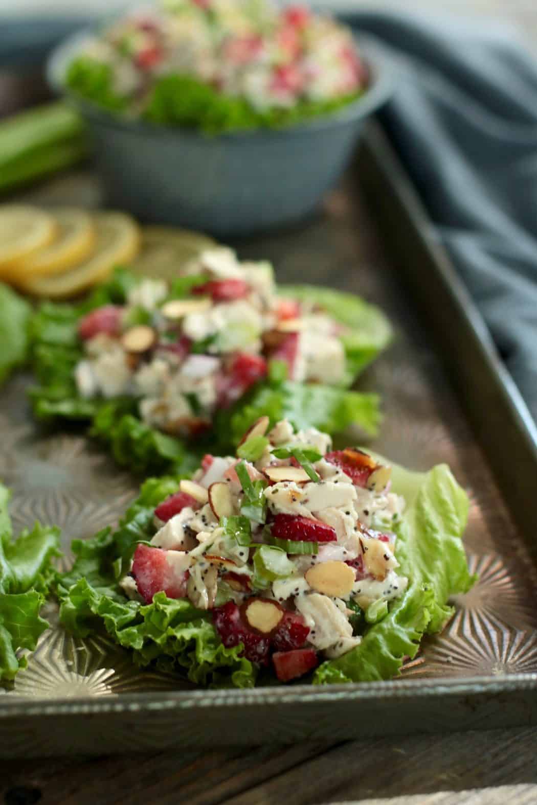 Strawberry Chicken Poppy Seed Salad on a baking sheet