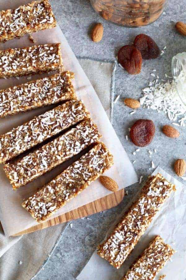 No bake Apricot Almond Coconut Energy Bars sliced on a cutting board