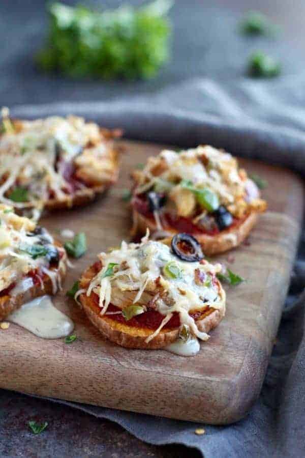 Chicken Supreme Sweet Potato Pizza Bites | pizza inspired recipes | healthy pizza alternatives | easy dinner recipes | healthy dinner recipes | Whole30 recipe ideas | Whole30 approved recipes | Whole30 dinner ideas | gluten free recipes | gluten free pizza recipes | healthy recipes using sweet potatoes | paleo dinner recipes | paleo friendly meals || The Real Food Dietitians