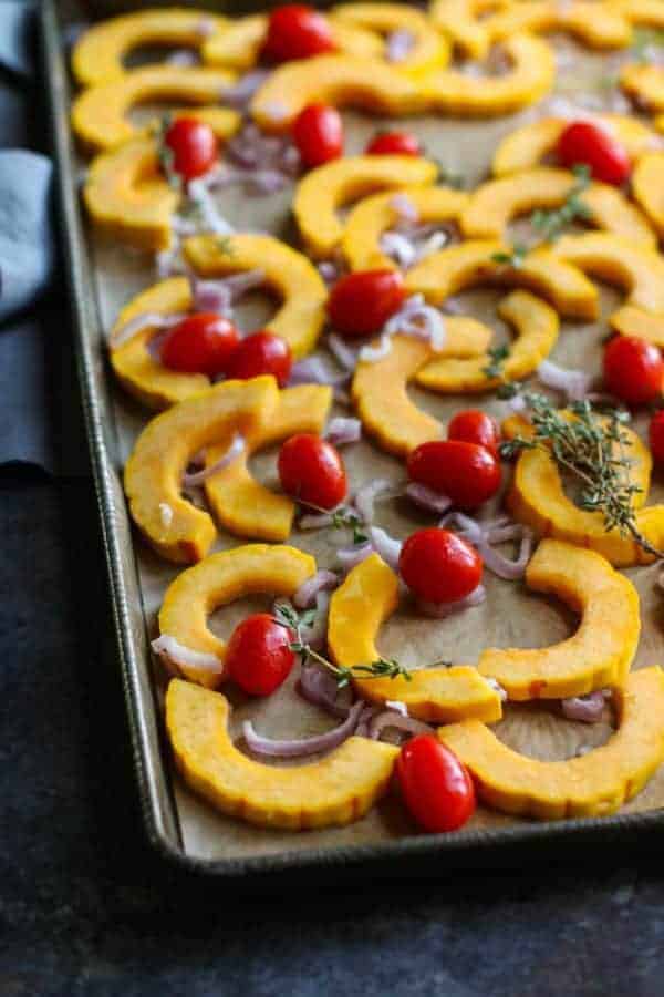 Roasted Delicata Squash with Tomatoes | healthy squash recipes | healthy side dishes | how to roast delicata squash | delicata squash recipes | Whole30 side dishes | gluten free side dishes | dairy free side dishes | paleo side dishes || The Real Food Dietitians 