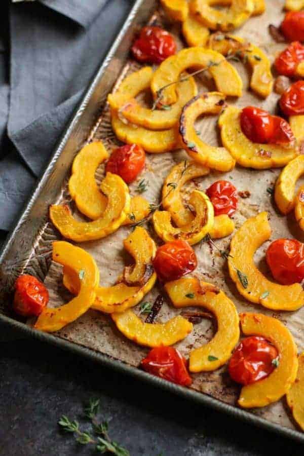 Roasted Delicata Squash with Tomatoes | healthy squash recipes | healthy side dishes | how to roast delicata squash | delicata squash recipes | Whole30 side dishes | gluten free side dishes | dairy free side dishes | paleo side dishes || The Real Food Dietitians 