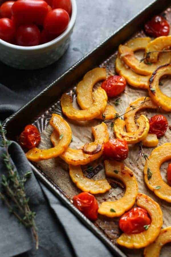 Roasted Delicata Squash with Tomatoes | healthy squash recipes | healthy side dishes | how to roast delicata squash | delicata squash recipes | Whole30 side dishes | gluten free side dishes | dairy free side dishes | paleo side dishes || The Real Food Dietitians 