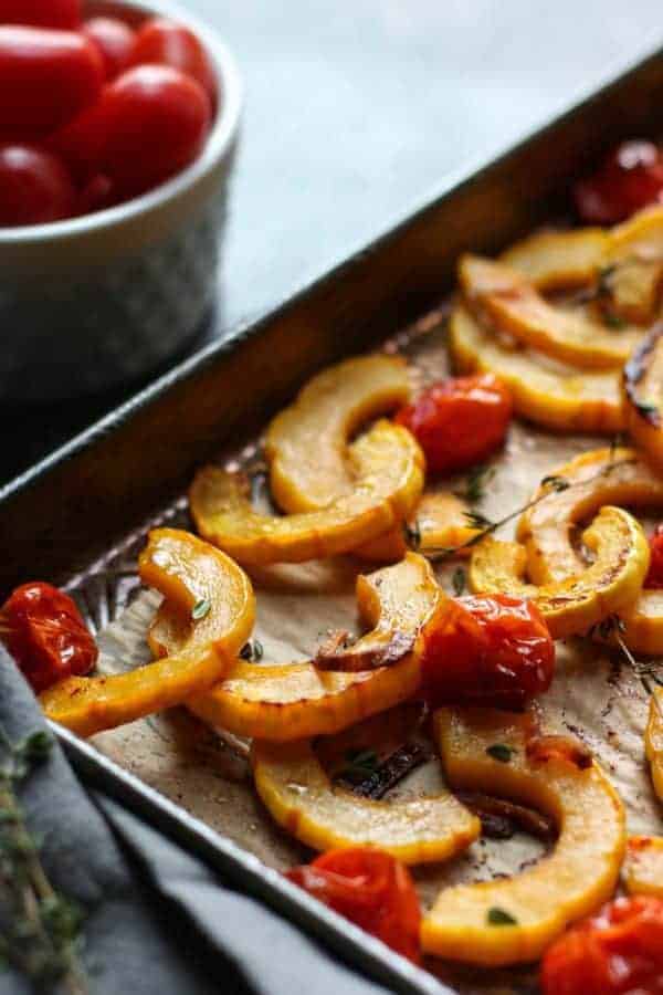 Roasted Delicata Squash with Tomatoes | healthy squash recipes | healthy side dishes | how to roast delicata squash | delicata squash recipes | Whole30 side dishes | gluten free side dishes | dairy free side dishes | paleo side dishes || The Real Food Dietitians 