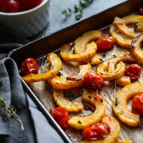 Roasted Delicata Squash with Tomatoes |The Real Food Dietitians | https://therealfooddietitians.com/roasted-delicata-squash-tomatoes-whole30/