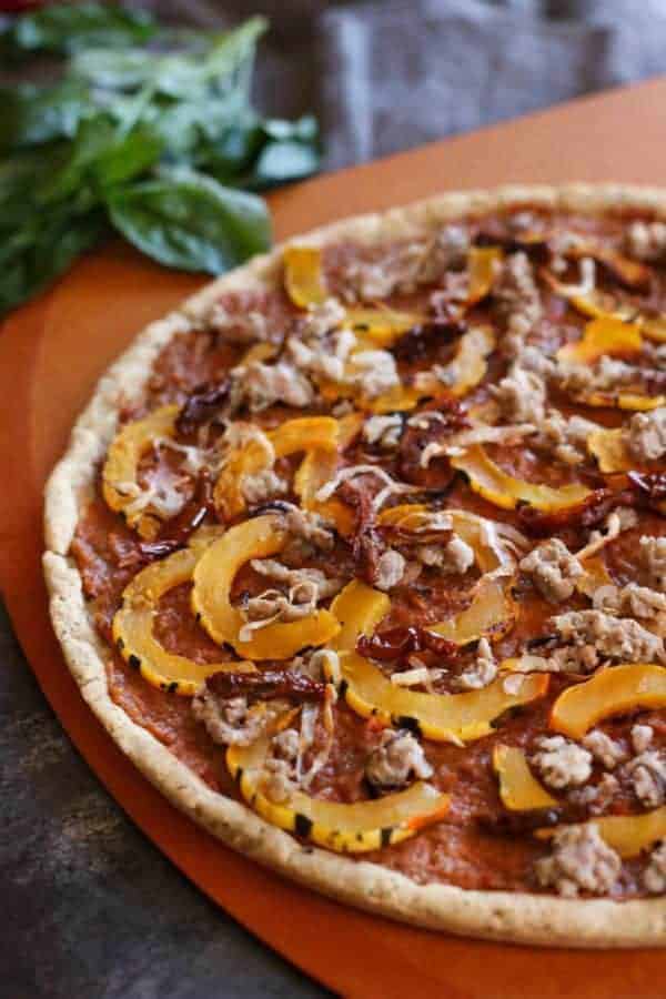 Grain-free Pizza with Sausage and Roasted Squash | healthy pizza recipes | homemade pizza recipes | gluten-free pizza | egg-free pizza | paleo pizza | dairy-free pizza | fall inspired recipes | roasted squash recipes || The Real Food Dietitians #healthypizza #paleopizza #grainfreepizza 