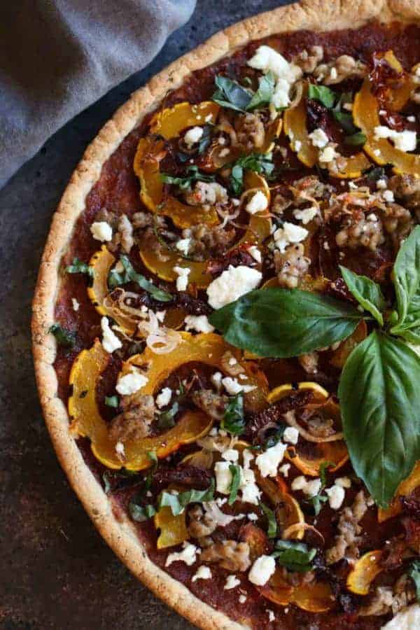 Grain-free Pizza with Sausage and Roasted Squash | healthy pizza recipes | homemade pizza recipes | gluten-free pizza | egg-free pizza | paleo pizza | dairy-free pizza | fall inspired recipes | roasted squash recipes || The Real Food Dietitians #healthypizza #paleopizza #grainfreepizza 