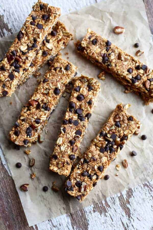 No-Bake Pumpkin Chocolate Chip Granola Bars laid out on a table top 