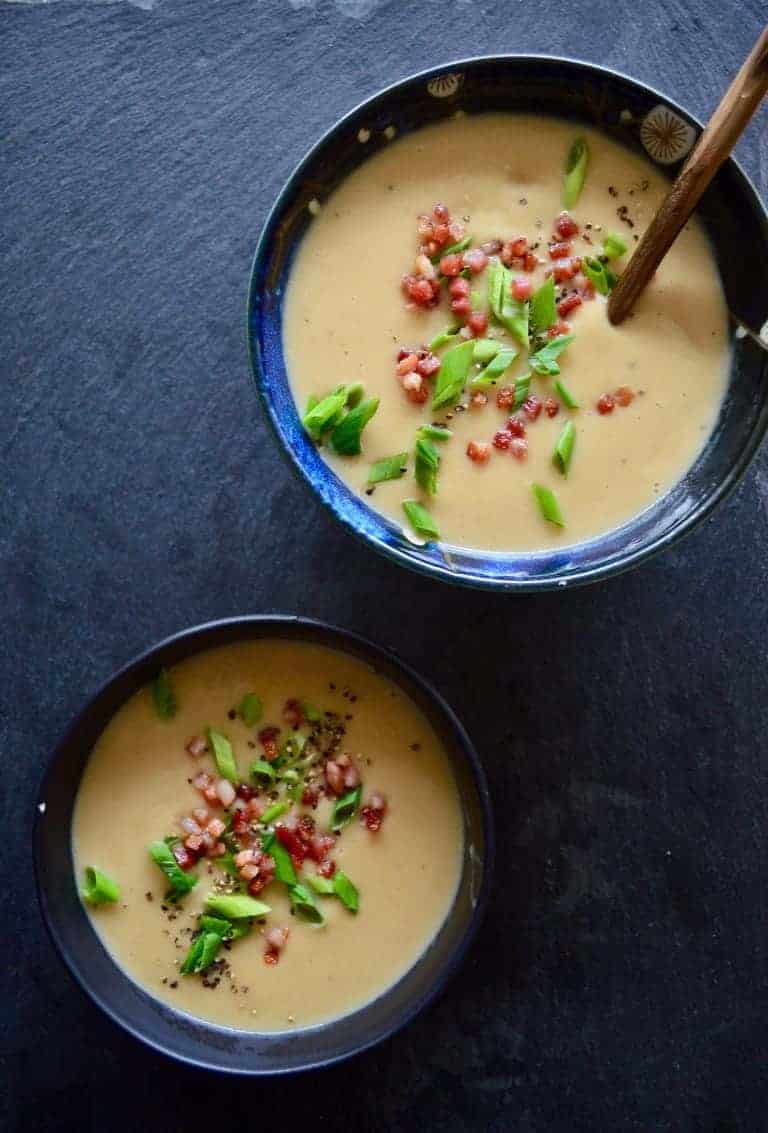 Creamy Cauliflower Soup with Truffle Salt & Pancetta from Real Food with Dana | 30 Whole30 Soups, Stews & Chilis | healthy soup recipes | whole30 meal ideas | whole30 recipes | whole30 chili recipes || The Real Food Dietitians #whole30soups #whole30recipe #whole30meals