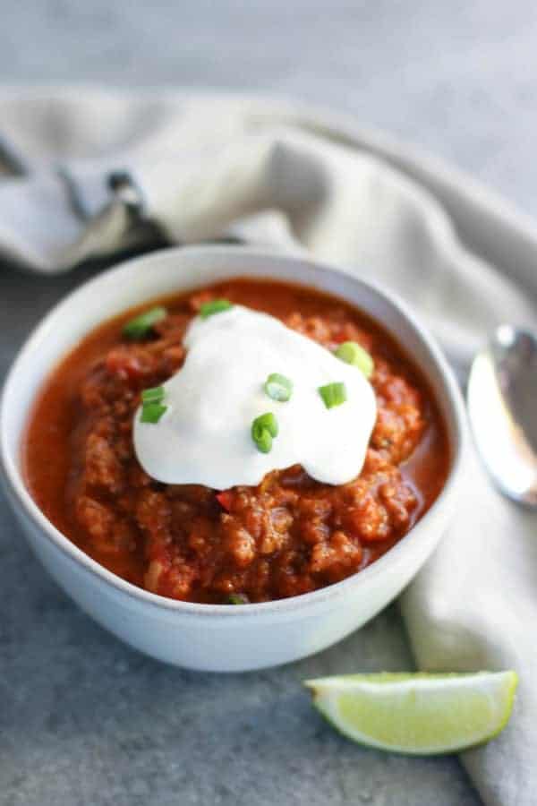 slow cooker pumpkin chili with plain yogurt topping