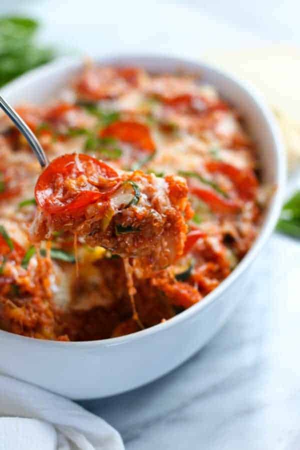 up close of spoonful of pepperoni pizza quinoa bake