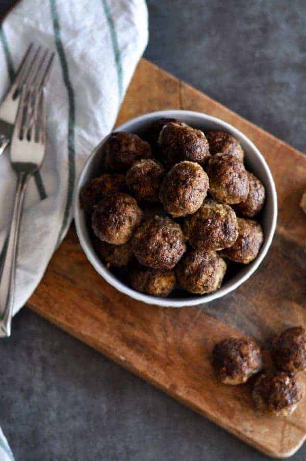 Baked Veggie Loaded Meatballs in a white bowl 