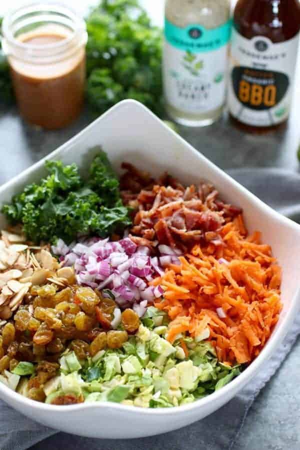 BBQ Ranch Chopped Salad with Brussels Sprouts & Kale ingredients in a white bowl