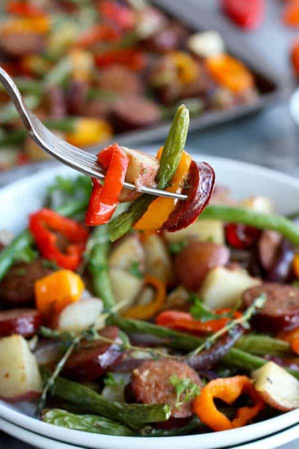 One-Pan Kielbasa Veggie Bake on a silver fork 