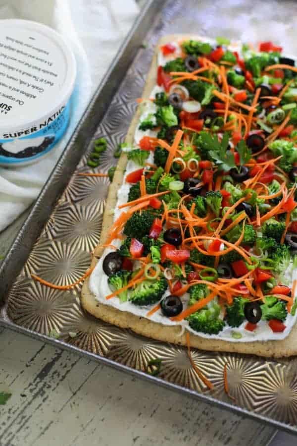 Gluten-free Veggie Pizza on a cooking sheet