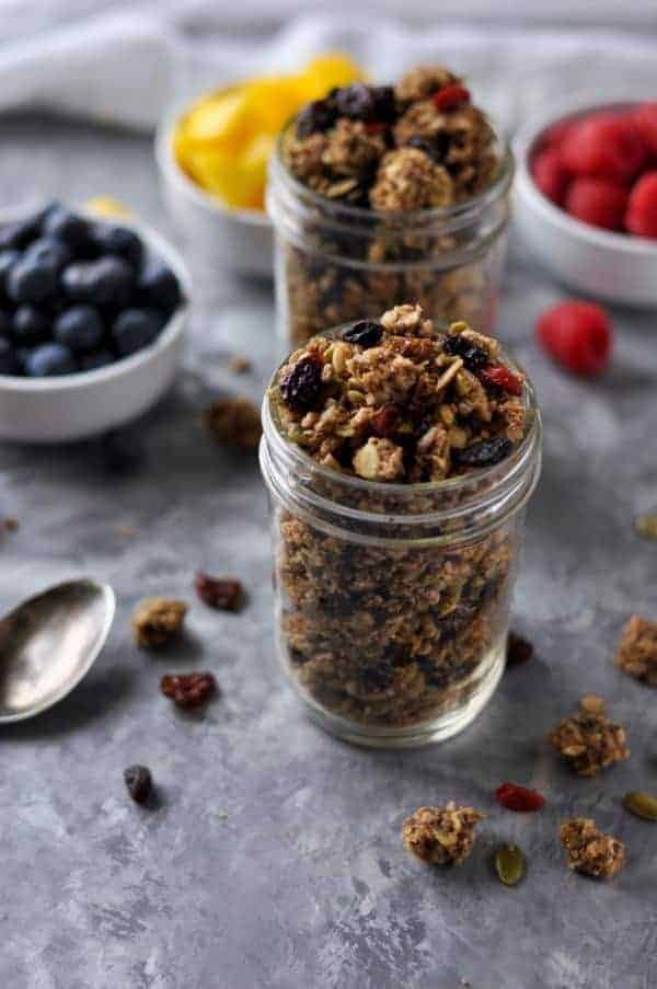 Side view of Nut-free Paleo Granola in a mason jar.