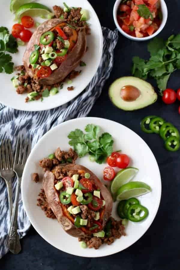 Taco-Stuffed Sweet Potatoes on a white plate