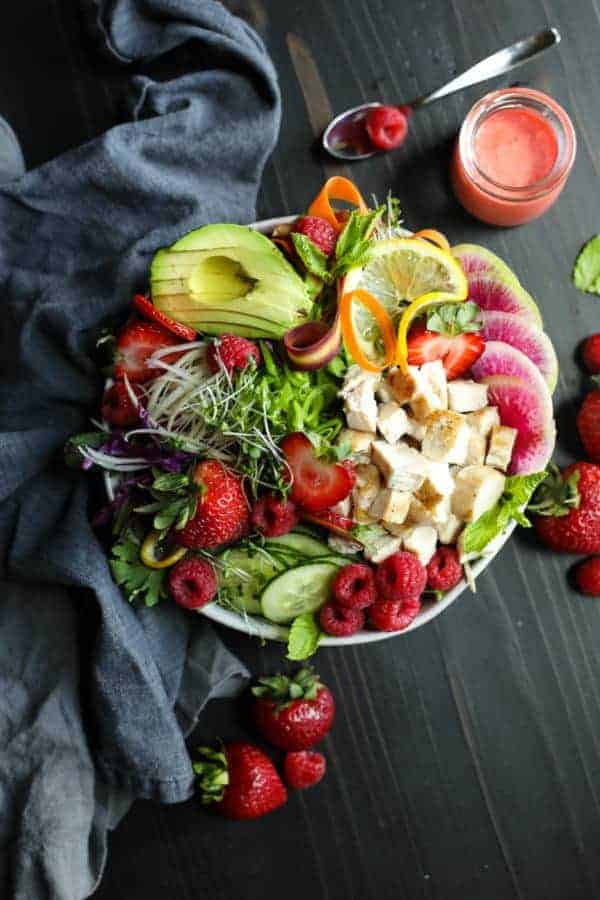 Berry Protein Salad Bowl on a brown table