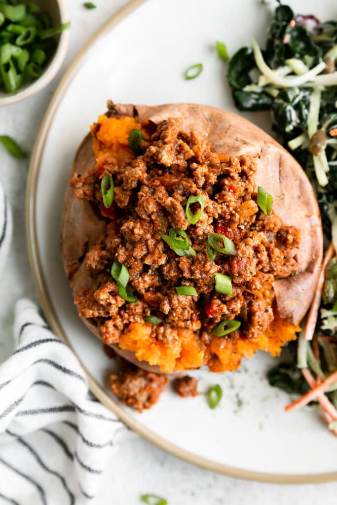 Close up overhead view sloppy joe stuffed baked sweet potato