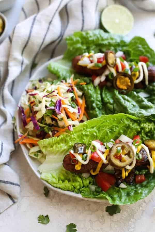 Sonoran Hot Dogs with Mexi Slaw on a white plate