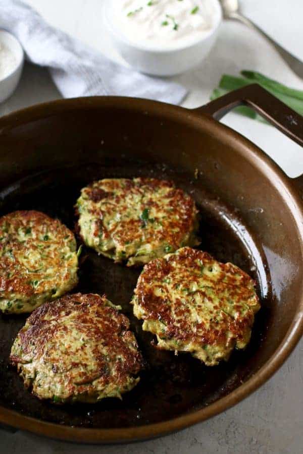 Savory Zucchini Fritters in a skillet