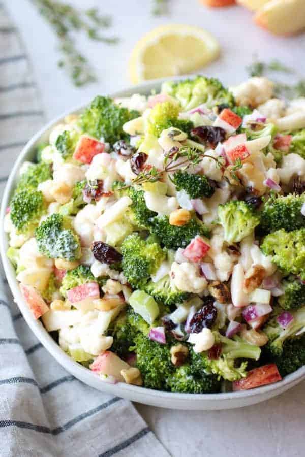 Apple Broccoli Cauliflower Salad in a white bowl
