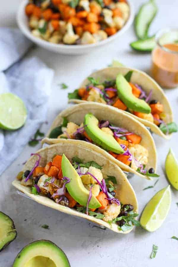 3 Vegan Cauliflower Sweet Potato Tacos without ranch dressing drizzle. 