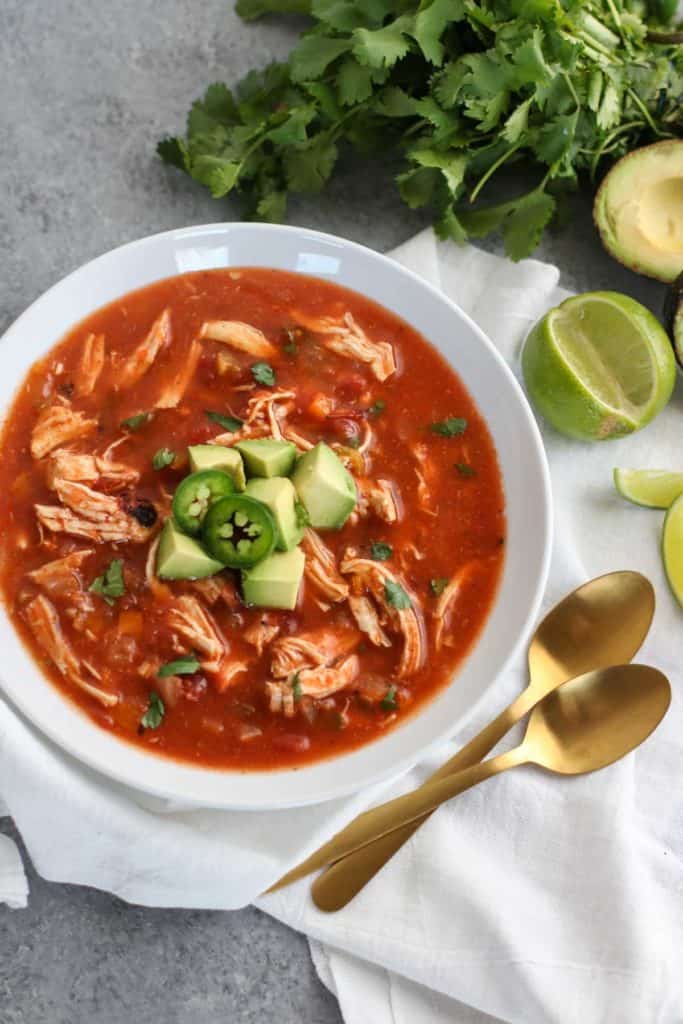 Aerial view of Chicken Tortilla Less Soup in a white bowl
